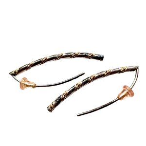 Twisted Glamour: Silver and Gold Earrings with Elegance